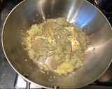 A picture of step 4 of Penne al'arrabiata (pasta with a spicy tomato sauce).