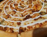 A picture of step 4 of Chicken tikka pizza shawarma.