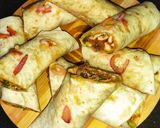A picture of step 17 of Chicken Frankie Roll.