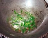A picture of step 1 of Garlic yellow rice.