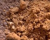 A picture of step 4 of Ragi coconut laddoos.