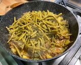 Une image de l'étape 11 de Haricots verts au bœuf, courgettes et curry.