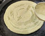 A picture of step 5 of Pesarattu with Coconut Peanut Chutney.