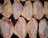 Foto del paso 4 de la receta: Alitas y patitas de pollo a la sidra
