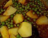 A picture of step 2 of Matar Aloo Tahari.