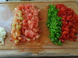 Arroz caldoso con bogavante berberechos en la cocina del camping