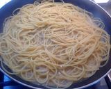 A picture of step 10 of Spaghetti with Langoustines, Shrimp, Calamari, and Clams.