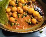 A picture of step 3 of Spiced baby potato curry with tomato.