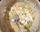 A picture of step 3 of Paneer cashew,peas in white gravy.
