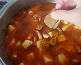 Foto del paso 6 de la receta: Patatas guisadas con calamar congelado