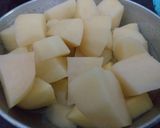 A picture of step 2 of Radish pods potato and peas.
