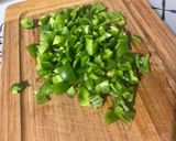 A picture of step 5 of Scrambled Eggs with Green Peppers, Red Onion, and Coulommiers Cheese.
