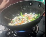 A picture of step 2 of Vegetable masala upma.