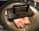 A picture of step 2 of Crispy chicken thigh with angel hair, mushroom and garlic butter cilantro sauce.