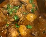 A picture of step 12 of Spicy Walnuts Masala Chicken Curry.