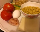 A picture of step 1 of Tomatoes Fried with Egg and Cheese Noodles.