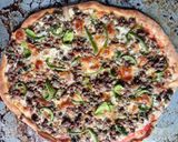 A picture of step 7 of Tasty budget friendly pizza😝.