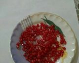 A picture of step 2 of Raw papaya Murraba.