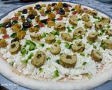 A picture of step 3 of Tikka n kabab pizza.