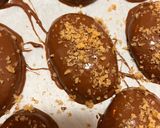 A picture of step 8 of Melomakarona with Chocolate Coating.