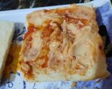 A picture of step 4 of Club chicken sandwich.