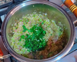 Foto del paso 7 de la receta: Calamares en su tinta con un toque de pasta de curry verde