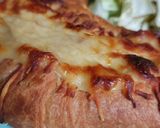 A picture of step 6 of Ham Croissant with Mornay Sauce.