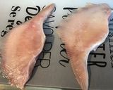 Une image de l'étape 1 de Ailes de raie citron romarin et épices.