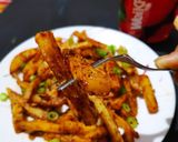 A picture of step 9 of Spicy finger chips.