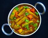 A picture of step 3 of Drumstick Curry.