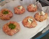 A picture of step 4 of Bring-a-smile chicken burgers with blue cheese or pesto filling 😊.