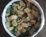 A picture of step 6 of Swiss Chard and Potato Casserole with Crispy Pepper Powder, Feta, and Lemon Zest.