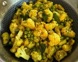 A picture of step 11 of Aloo Gobhi Matar Ki Sabzi.