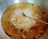 A picture of step 5 of Mexican bunuelos.