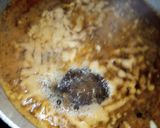 A picture of step 4 of Twist macaroni jollof.