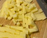 Foto del paso 6 de la receta Muslos de pollo en salsa y patatas en freidora de aire