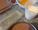 Foto del paso 2 de la receta: Postre de Vainillas con chocolate, crema y frutas