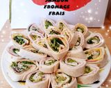 A picture of step 4 of Mini Ham and Cream Cheese Wraps.
