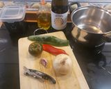A picture of step 1 of Suquet de Monkfish, Red Shrimp, and Baby Squid with Almond and Hazelnut Picada.