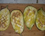 Une image de l'étape 1 de Aubergines farcies au boulgour à l'indienne.