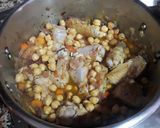 Foto del paso 11 de la receta Garbanzos con alitas de pollo, especia y toque de pimentón