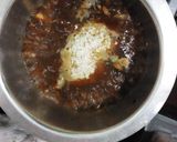 A picture of step 6 of Chicken pilau.