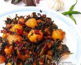 A picture of step 9 of Sauteed baby potatoes with beetroot and amaranth leaves.