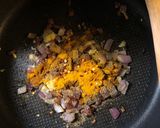 A picture of step 5 of Potato, cauliflower and pea curry - vegan.