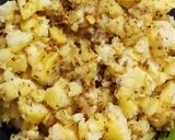 A picture of step 9 of Aloo walay nan.