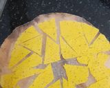 A picture of step 3 of Doritos (nachos chips) in cheese sauce.