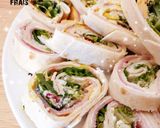 A picture of step 3 of Mini Ham and Cream Cheese Wraps.