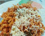 A picture of step 7 of Penne pasta with cheese.
