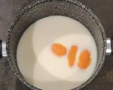 Foto del passaggio 3 della ricetta Sfogliatine con budino alla vaniglia ananas e amaretti