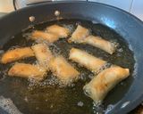 A picture of step 10 of Thai minced pork spring rolls.